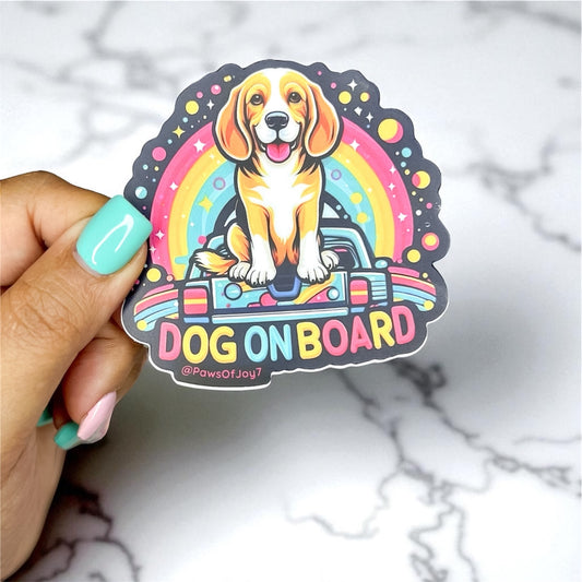 Colorful 'Dog on Board' sticker with a dog illustration held by a hand on a marble background