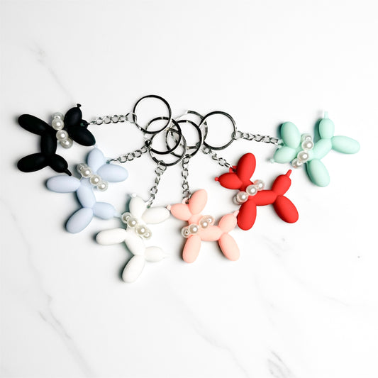 PVC Balloon Dog keychain in minimalist design, lightweight and durable, bringing playful charm and a touch of joy for dog moms on the go.
