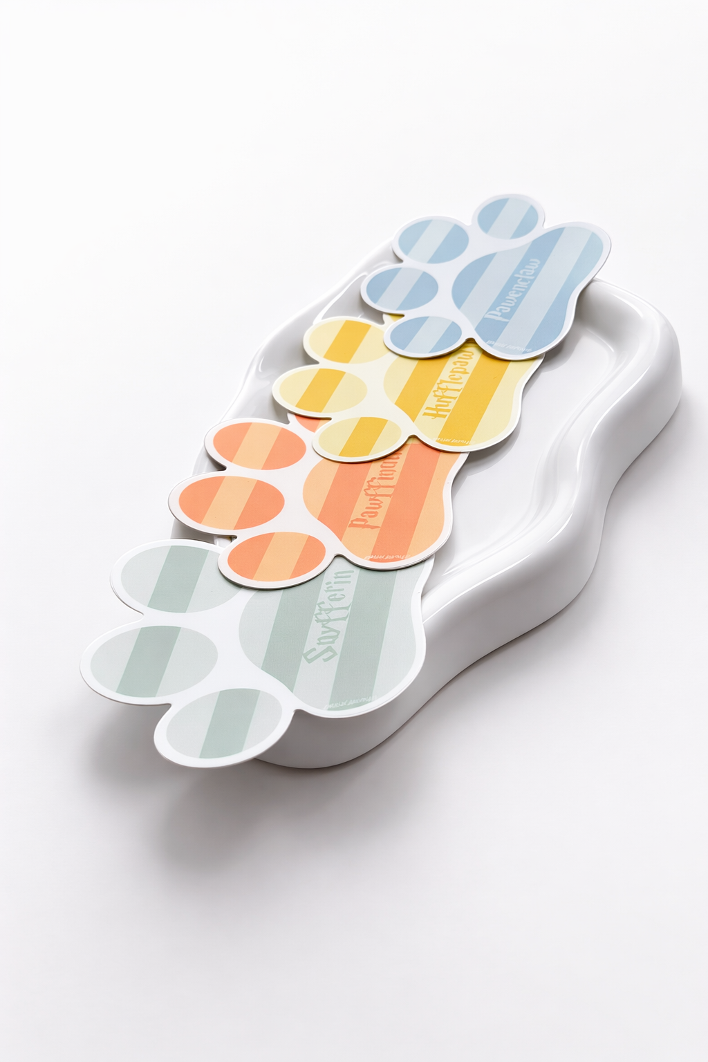 Color swatch palette shaped like a paw print on a white background