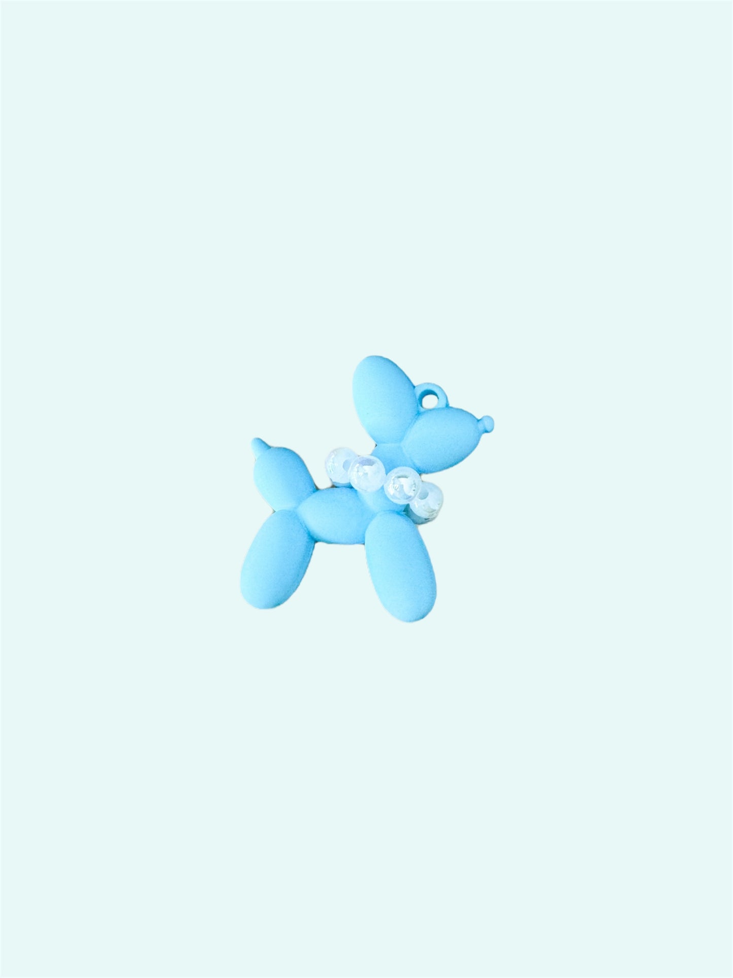 Mini acrylic balloon dog keychain with clear elegant design, lightweight and portable, reflecting the joy and love shared with your dog.