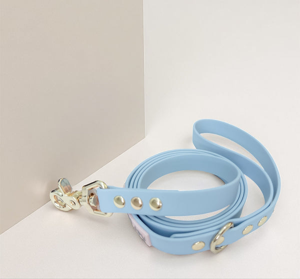 Serenity Blue waterproof dog leash with light gold hardware, blending calm beauty and comfort for peaceful walks shared with your dog.