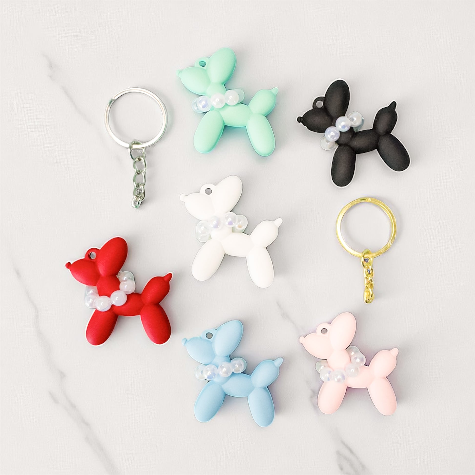 Mini acrylic balloon dog keychain with clear elegant design, lightweight and portable, reflecting the joy and love shared with your dog.