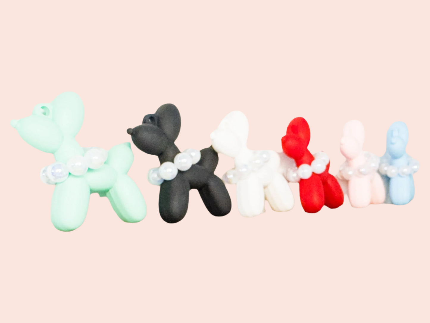 Mini acrylic balloon dog keychain with clear elegant design, lightweight and portable, reflecting the joy and love shared with your dog.