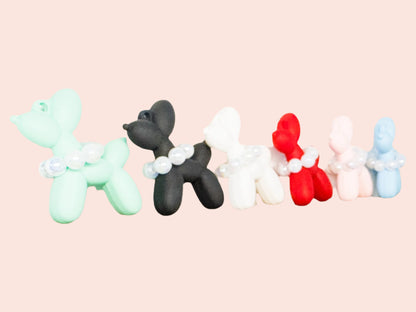 Mini acrylic balloon dog keychain with clear elegant design, lightweight and portable, reflecting the joy and love shared with your dog.